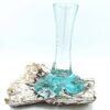 Geschmolzenes Glas auf getünchtem Holz